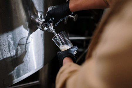 Beer Being Poured In Glass for Quality Control