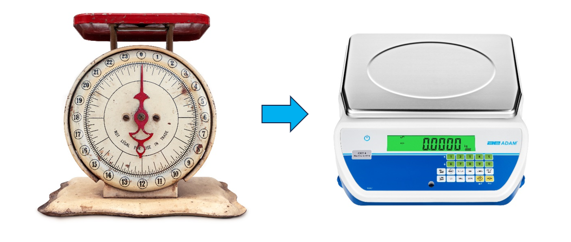 An old-fashioned kitchen scale next to a modern Adam Equipment digital scale